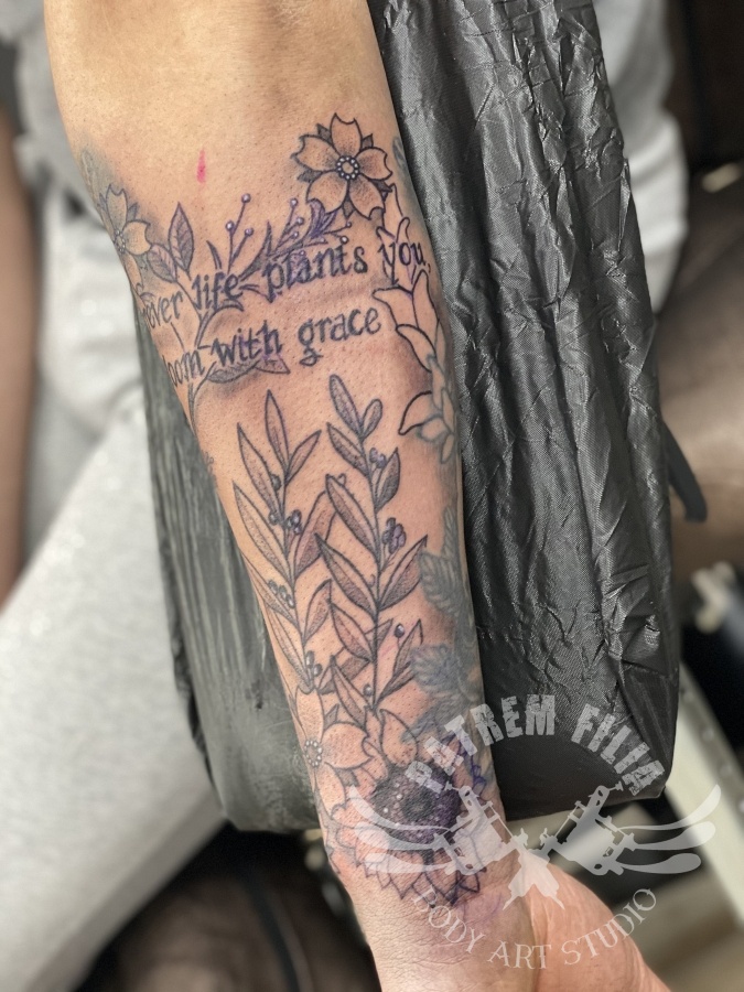 bloemen met tekst Tattoeages
