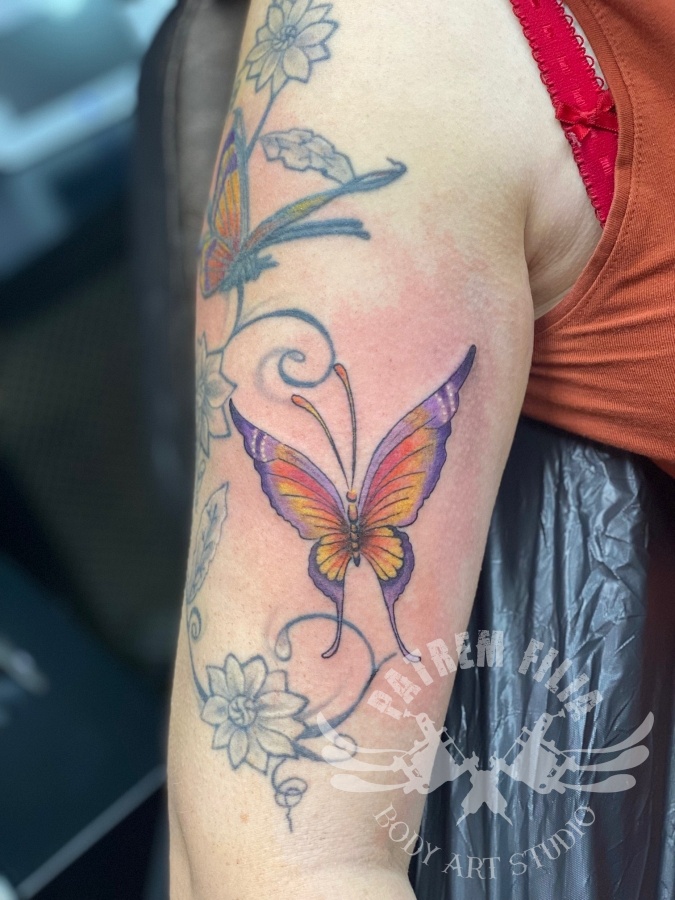 gekleurde vlinder Tattoeages