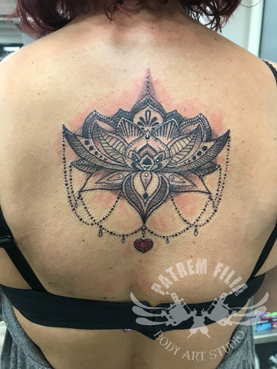 Mandala lotus Tattoeages
