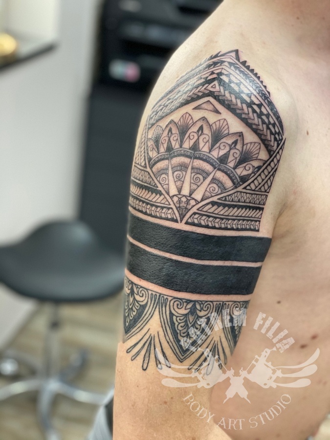 Maori stijl cover up Tattoeages