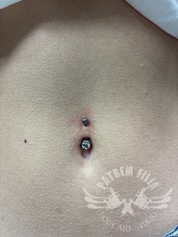 Navelpiercing — een kleine blikvanger