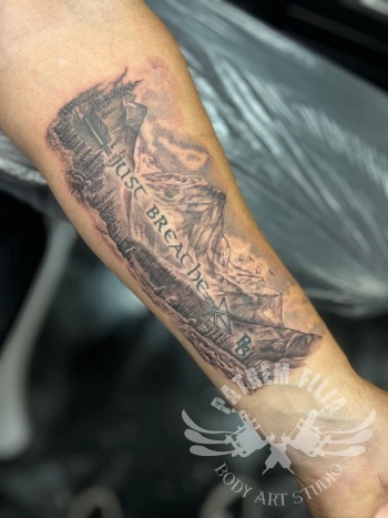 Just Breathe - onderarm tattoo