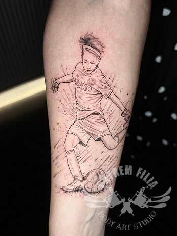 Voetbalportret tattoo — een moment voor altijd vastgelegd