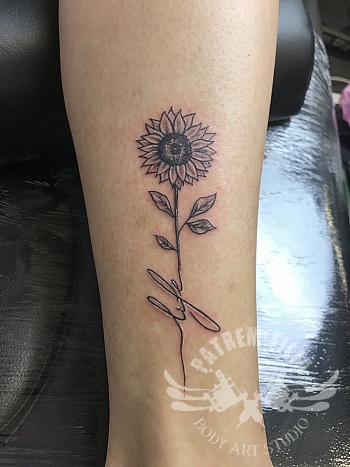 Zonnebloem tattoo
